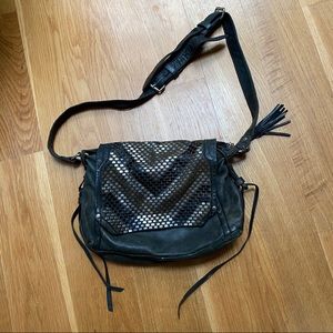 Olivia Harris leather bag w/ metal stud detailing and side tassel chain